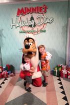 Our first big meal at Disney -- Minnie's Holiday Dinner. The boys loved meeting Santa Goofy